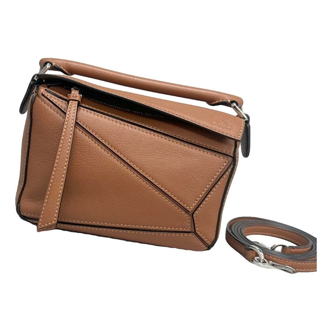Puzzle leather handbag