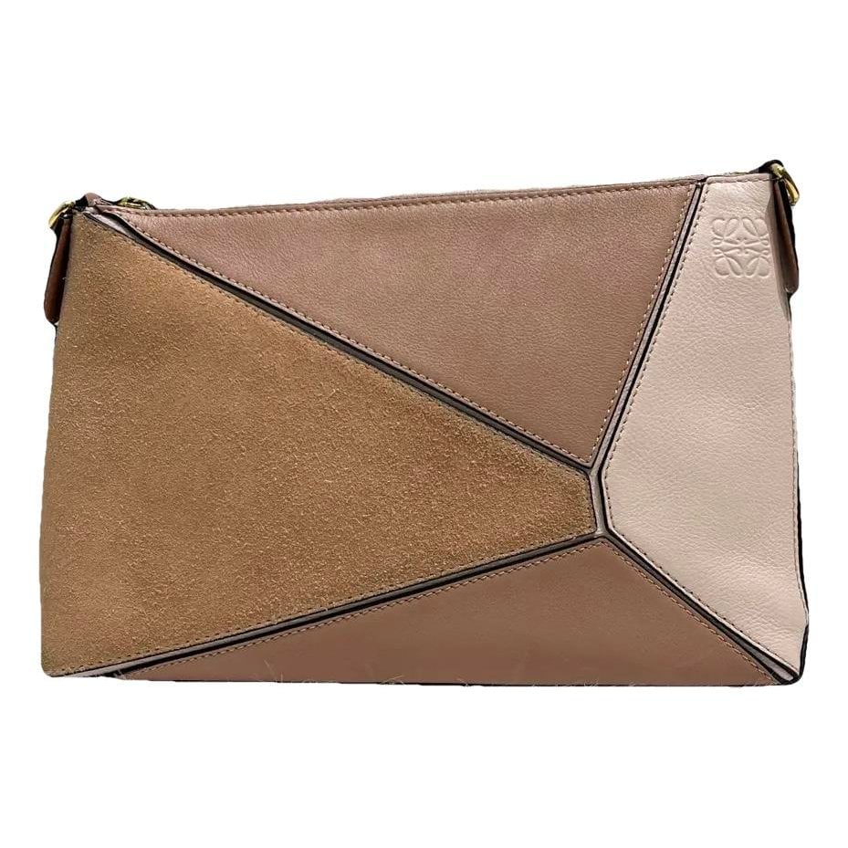 Puzzle leather handbag