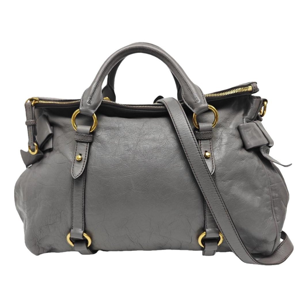 Bow bag leather handbag