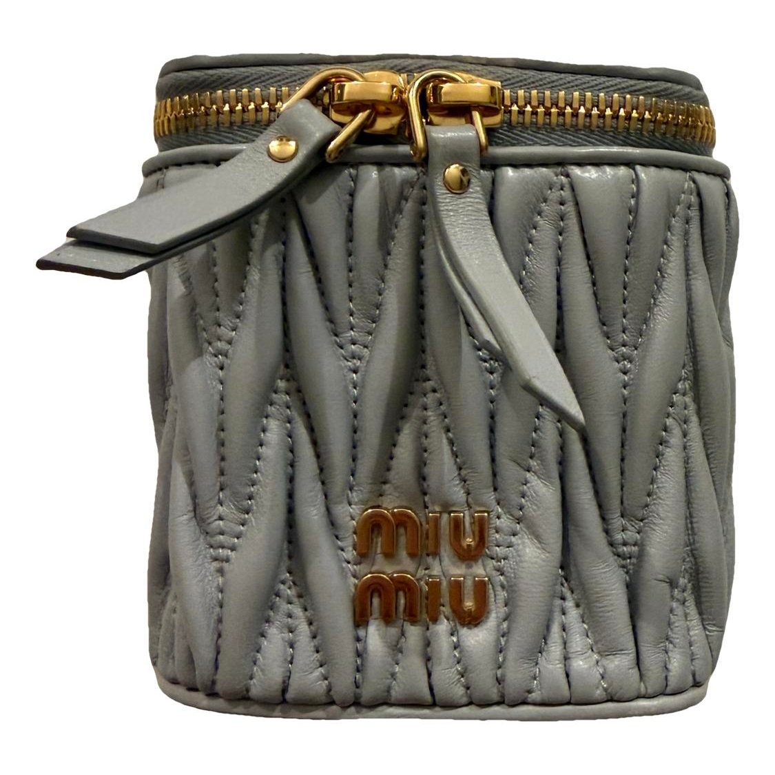 Matelassé leather clutch bag