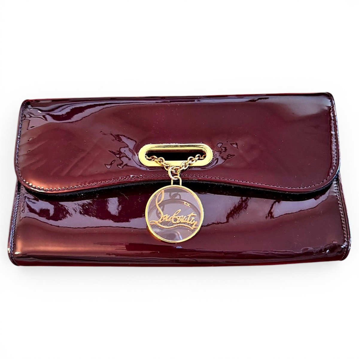 Riviera patent leather clutch bag