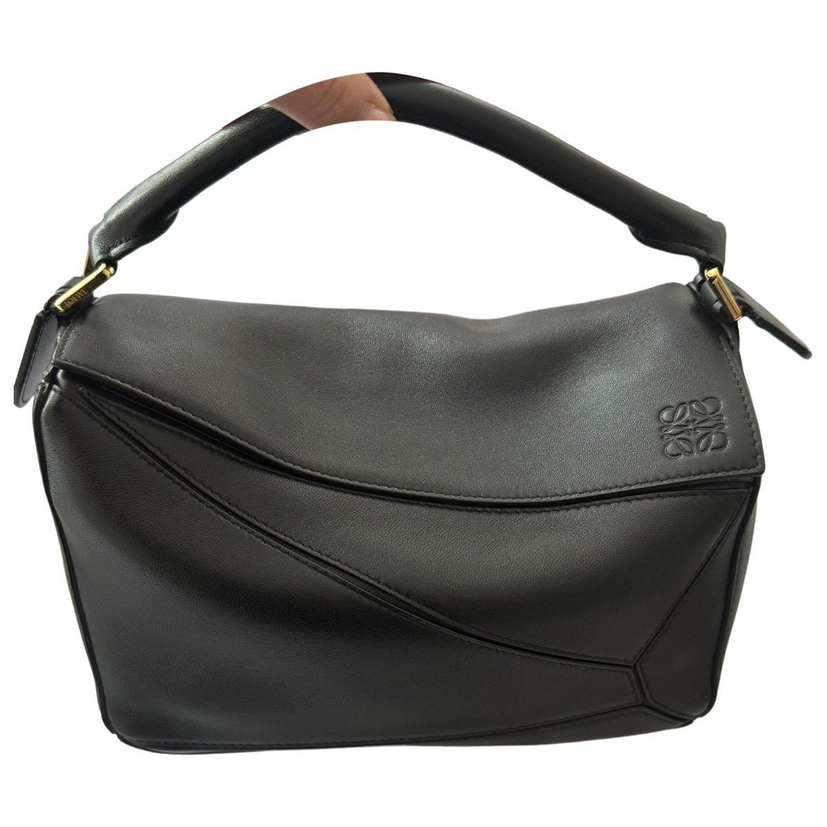 Puzzle leather handbag