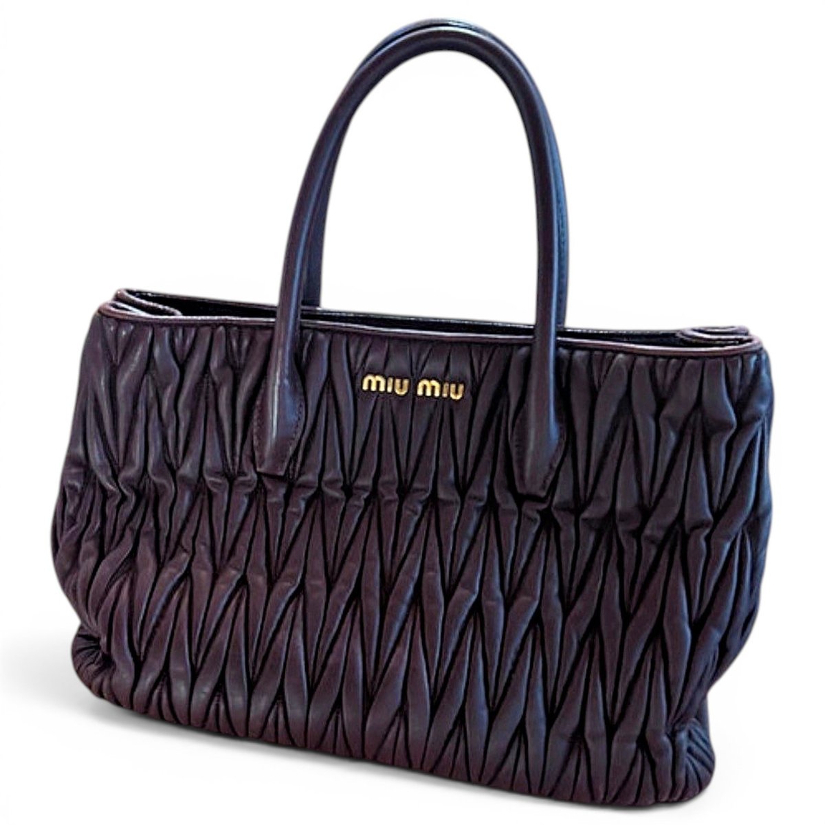 Matelassé leather handbag