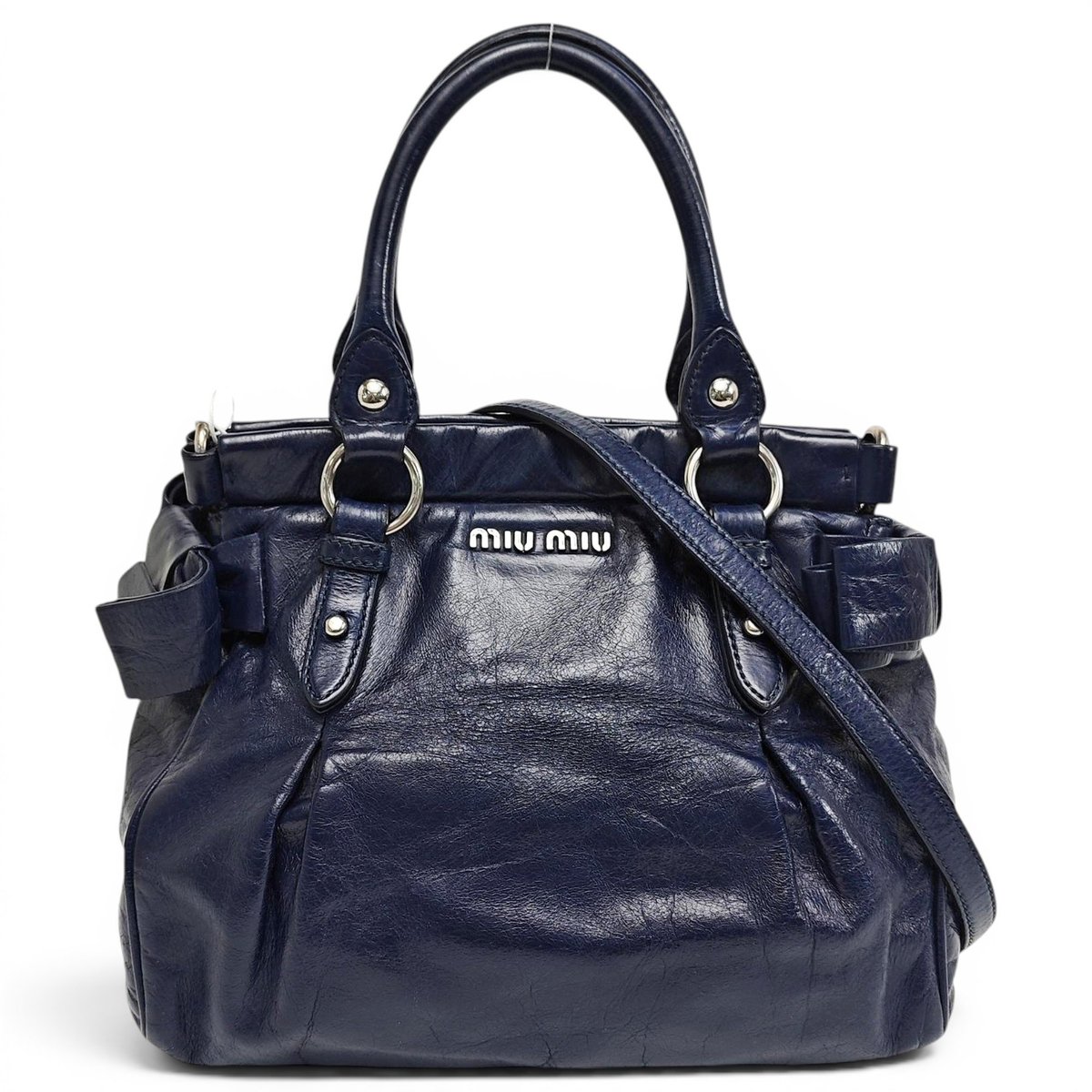 Bow bag leather handbag
