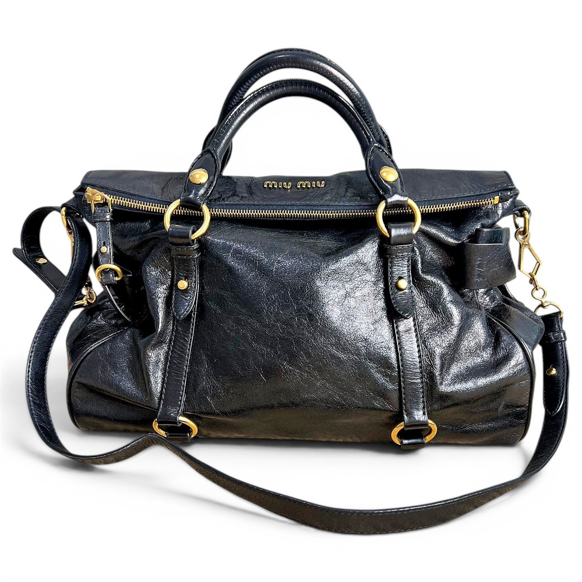 Bow bag leather handbag
