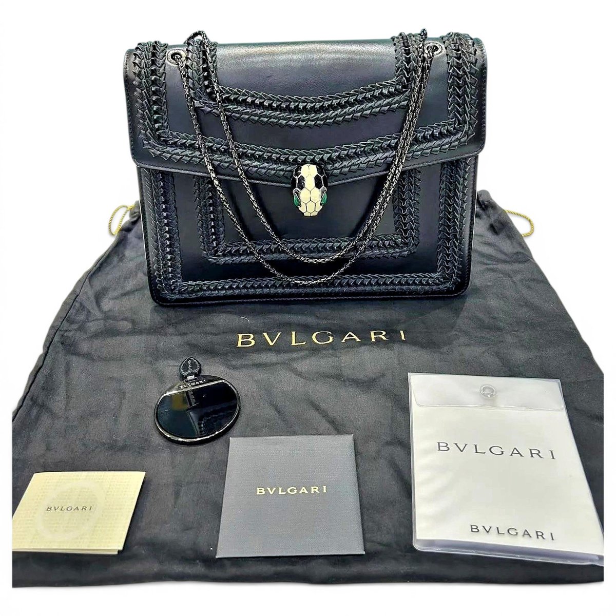 Serpenti leather handbag