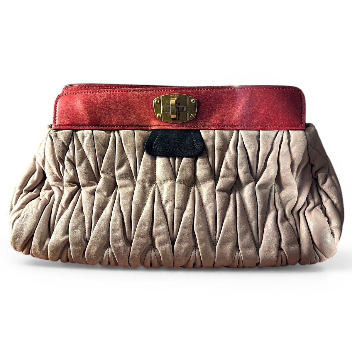 Matelassé leather clutch bag