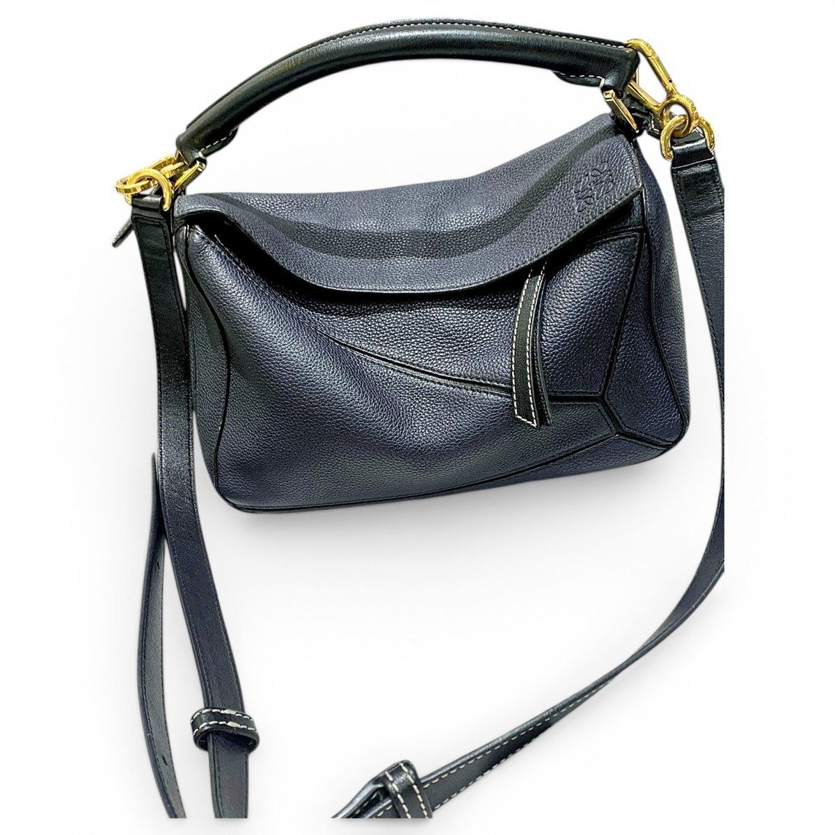Puzzle leather handbag