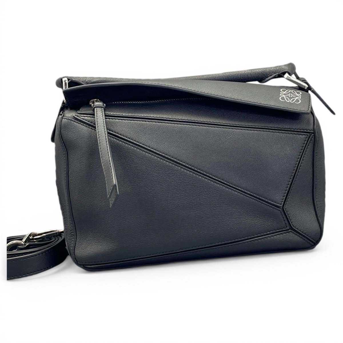 Puzzle leather handbag