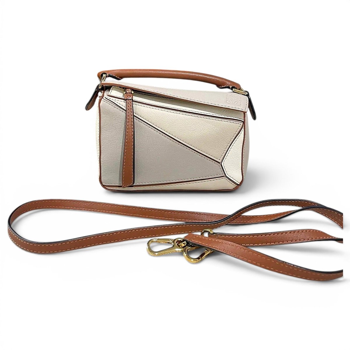 Puzzle leather crossbody bag