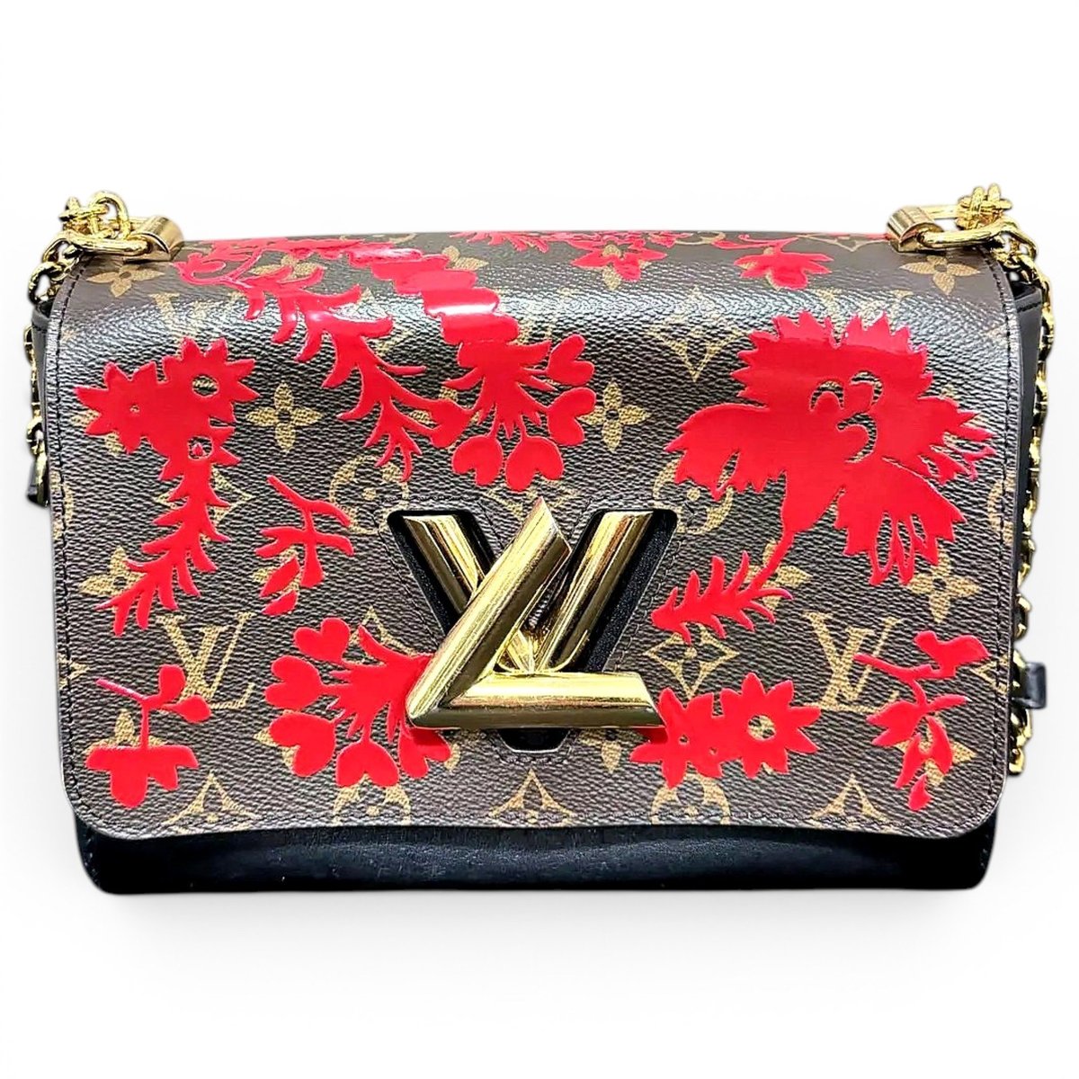 Twist vinyl crossbody bag