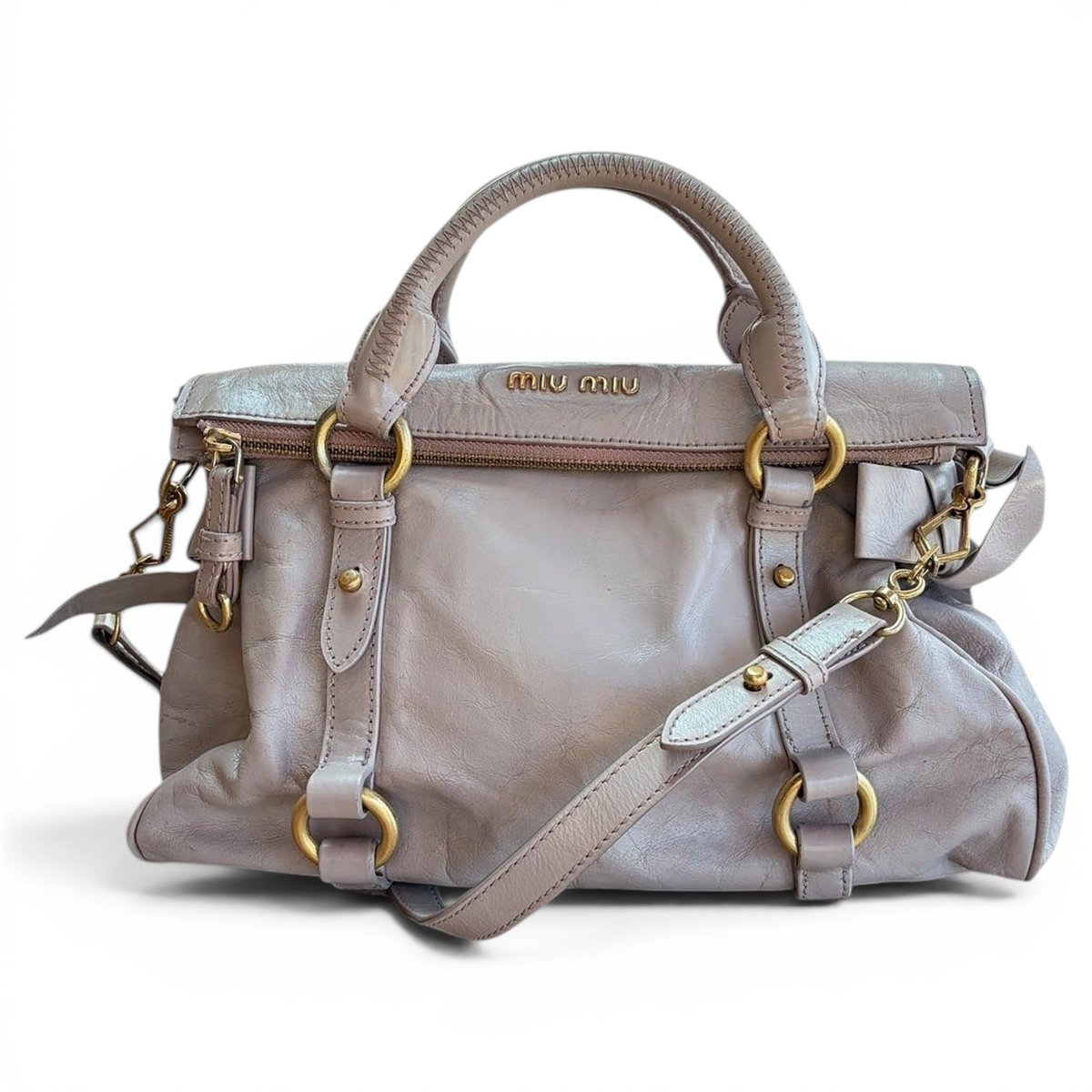 Bow bag leather handbag