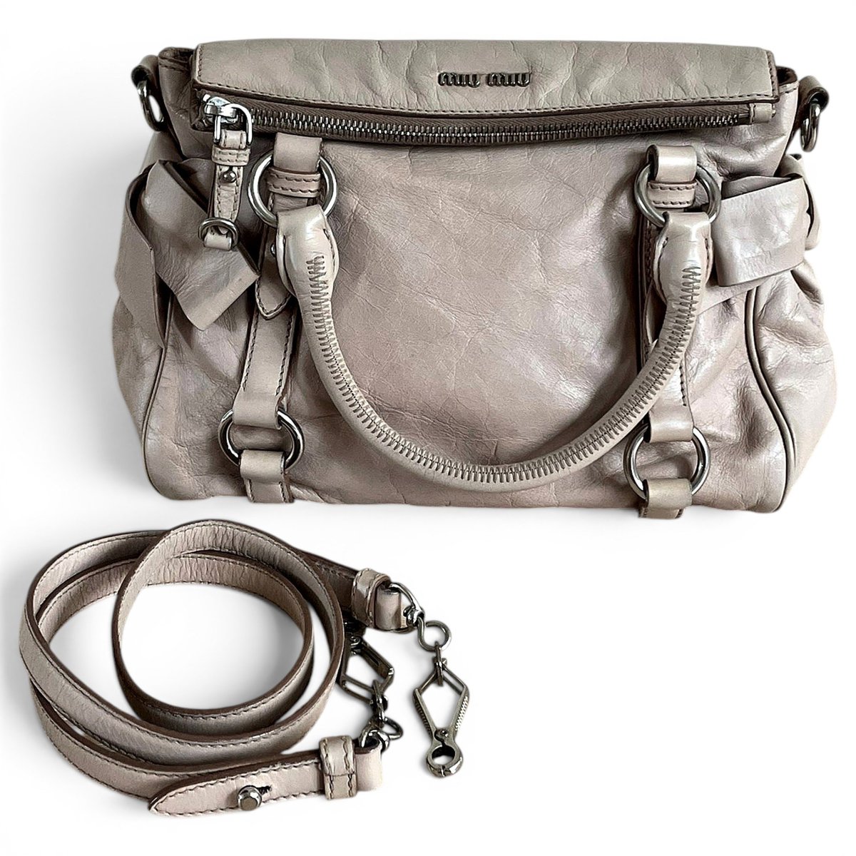 Bow bag leather handbag