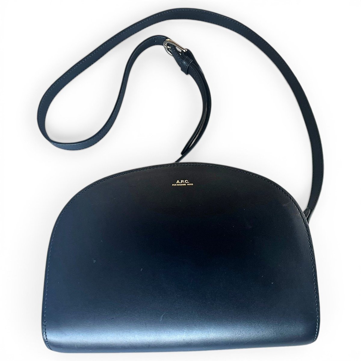 Demi-lune leather handbag
