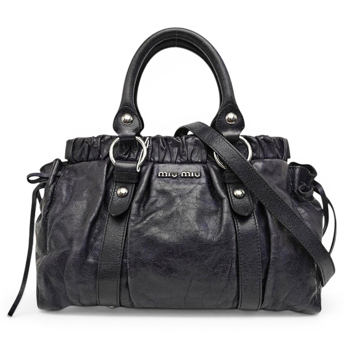 Bow bag leather handbag