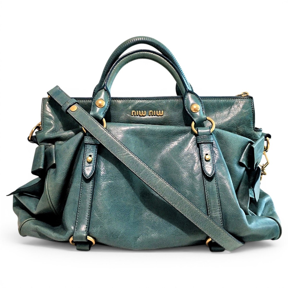 Bow bag leather handbag