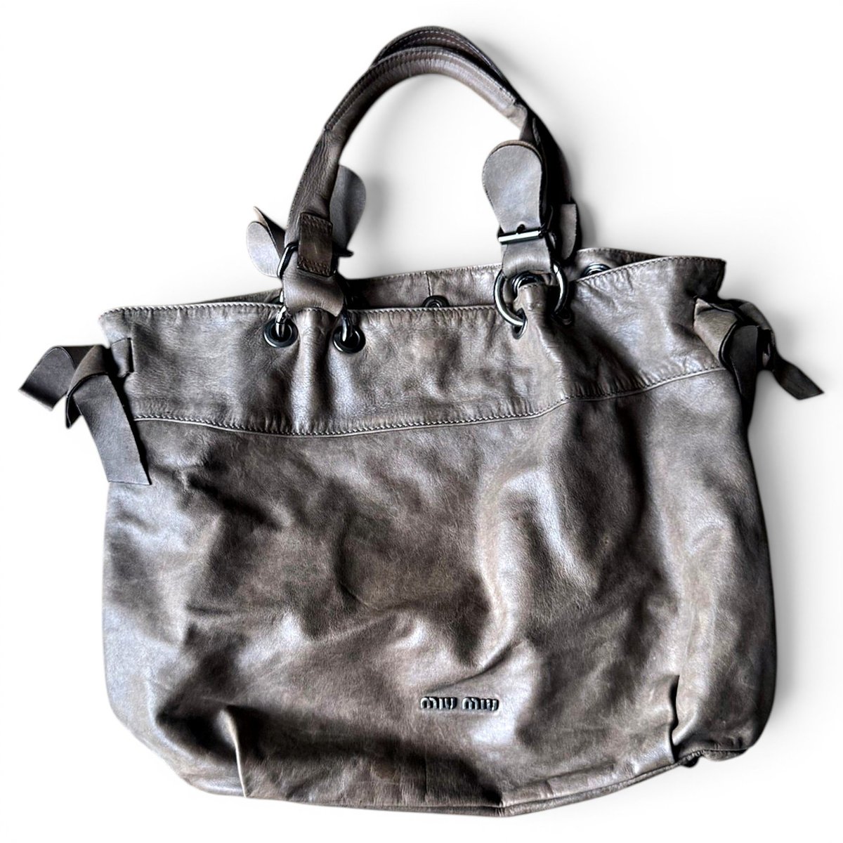 Bow bag leather handbag
