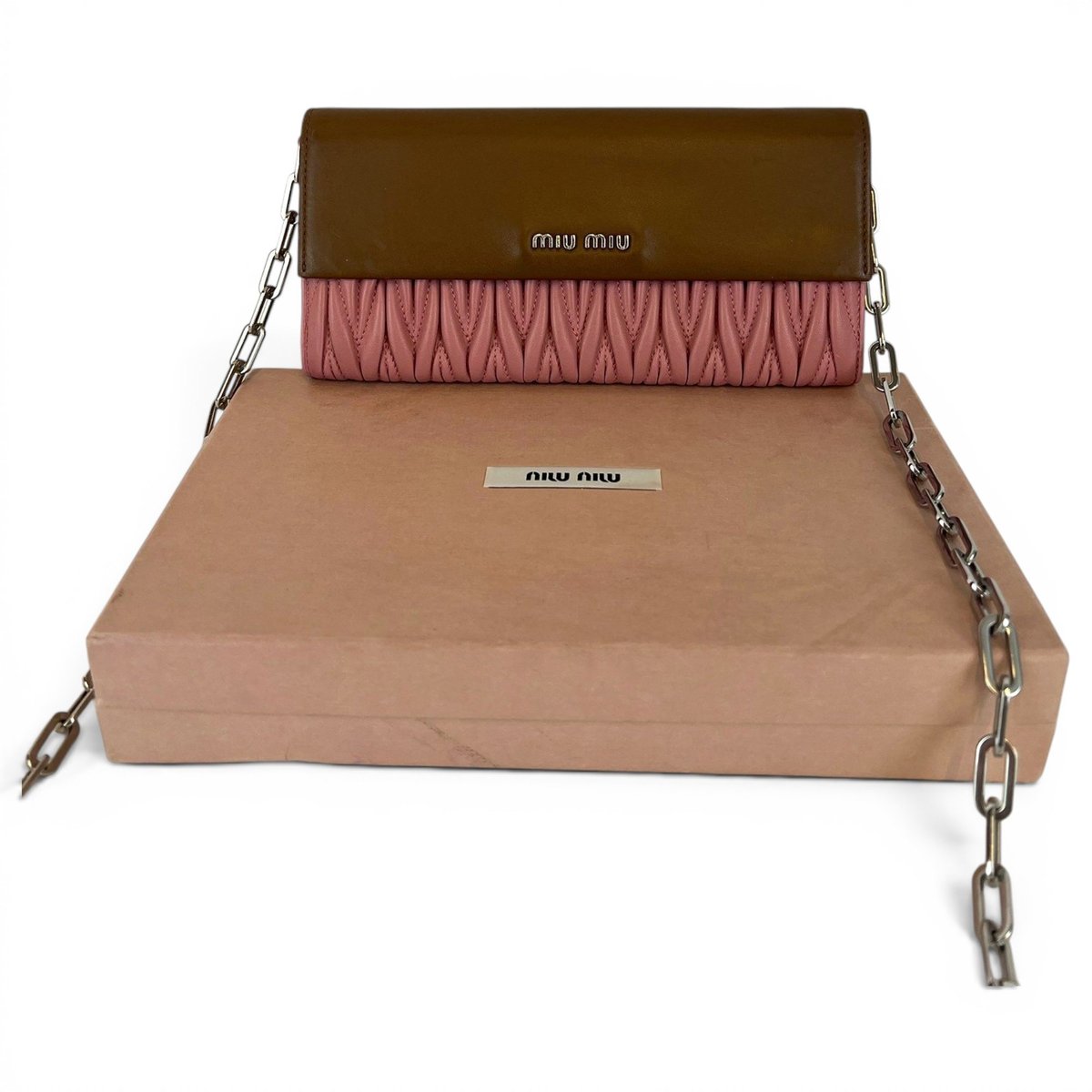 Matelassé leather clutch bag