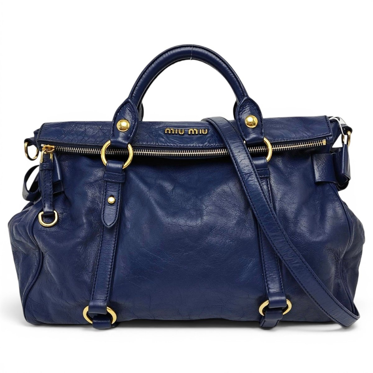 Bow bag leather handbag