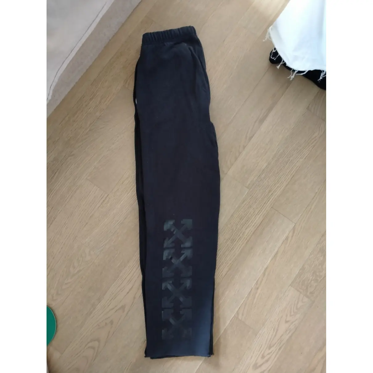 Buy Off-White Trousers online