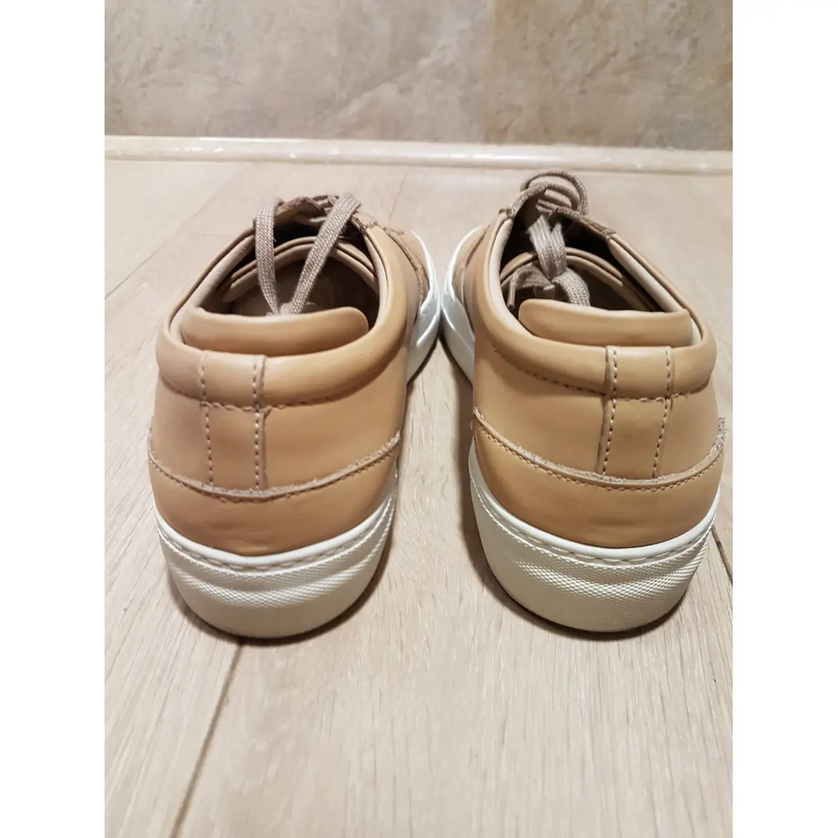 Leather low trainers Axel Arigato
