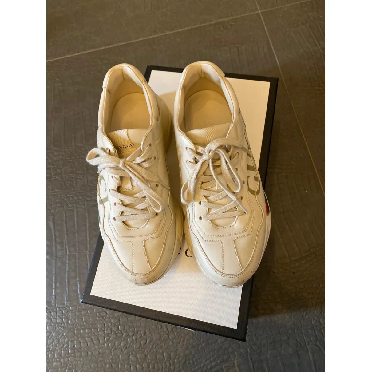Buy Gucci Rhyton leather trainers online