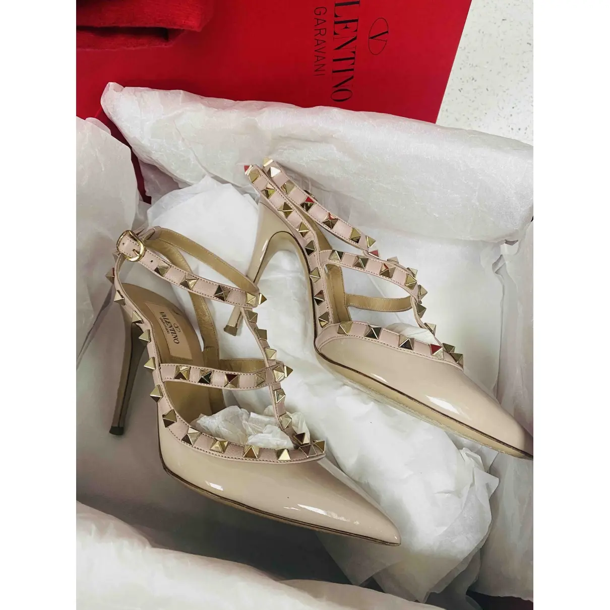 Buy Valentino Garavani Rockstud patent leather heels online