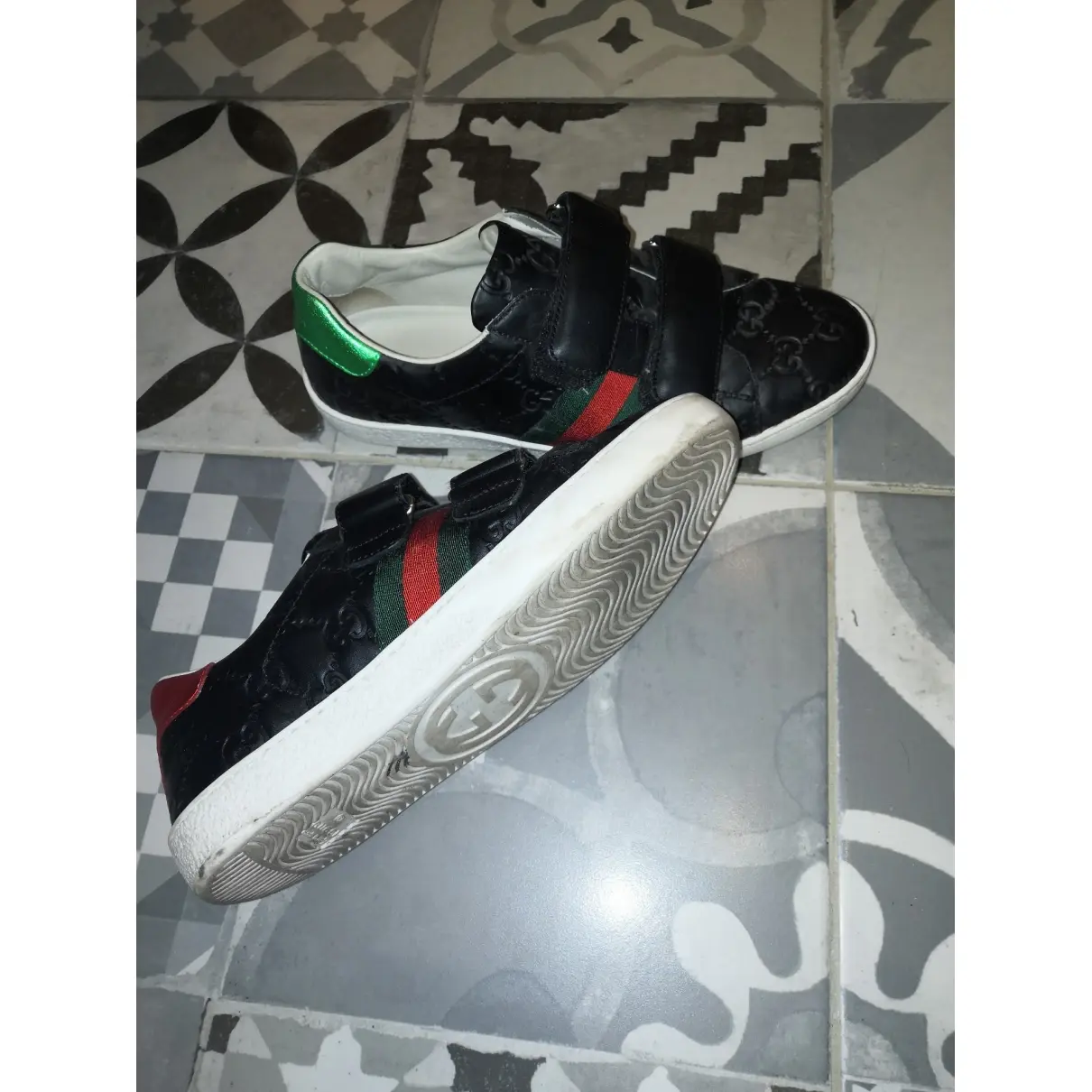 Buy Gucci Ace leather trainers online