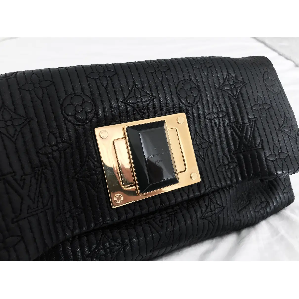 Buy Louis Vuitton Altair leather clutch bag online