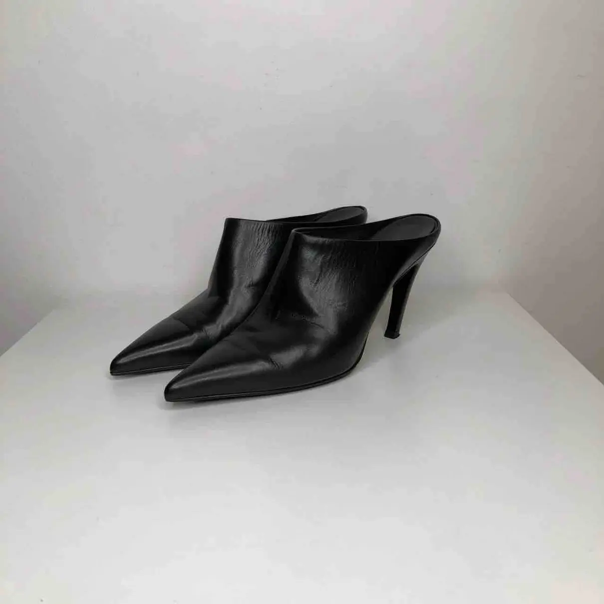 Buy Balenciaga Leather mules & clogs online