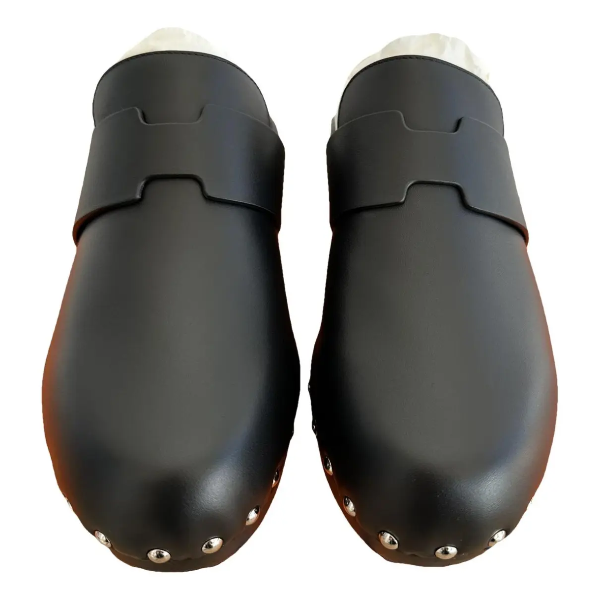 Calya leather mules & clogs