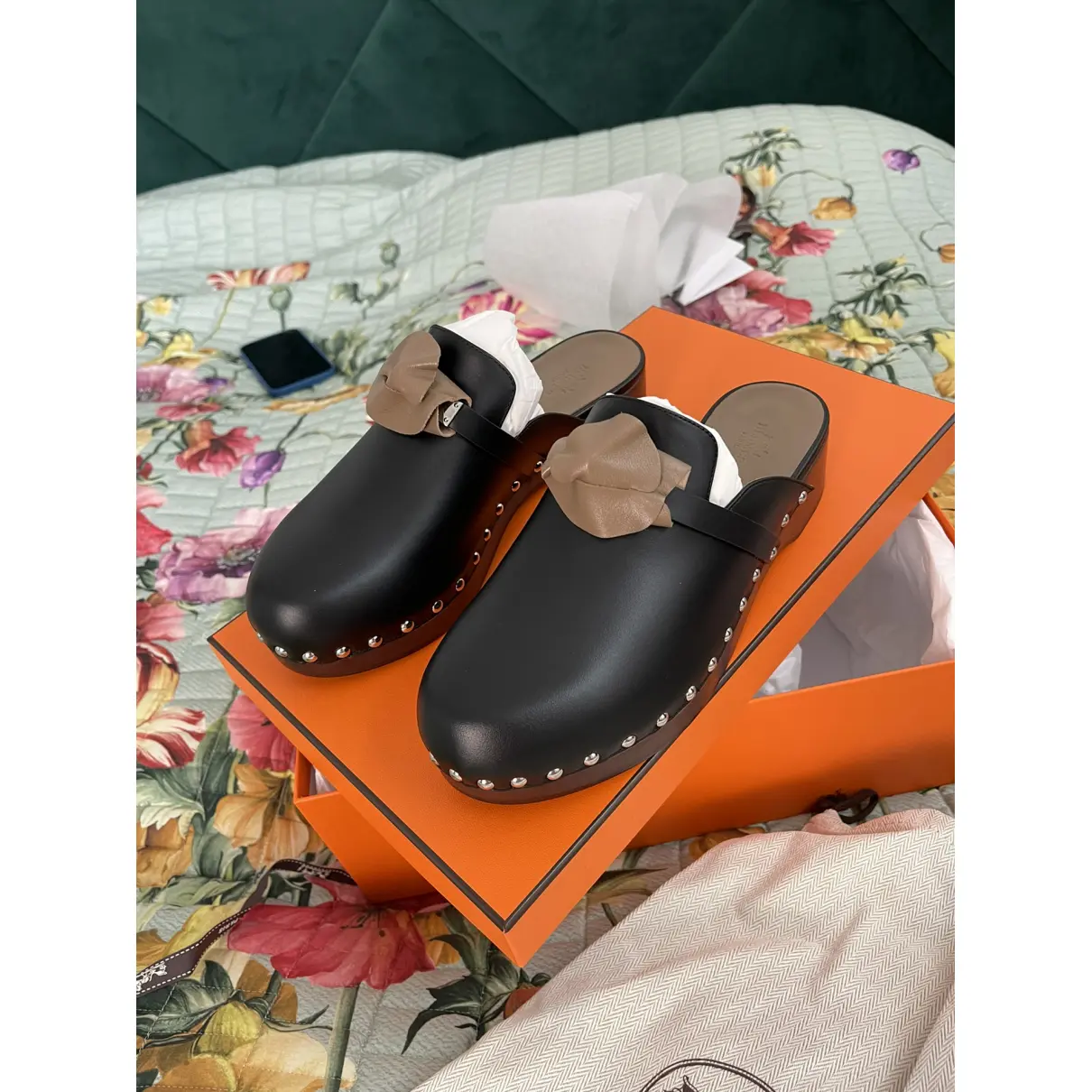 Buy Hermès Carlotta leather mules & clogs online