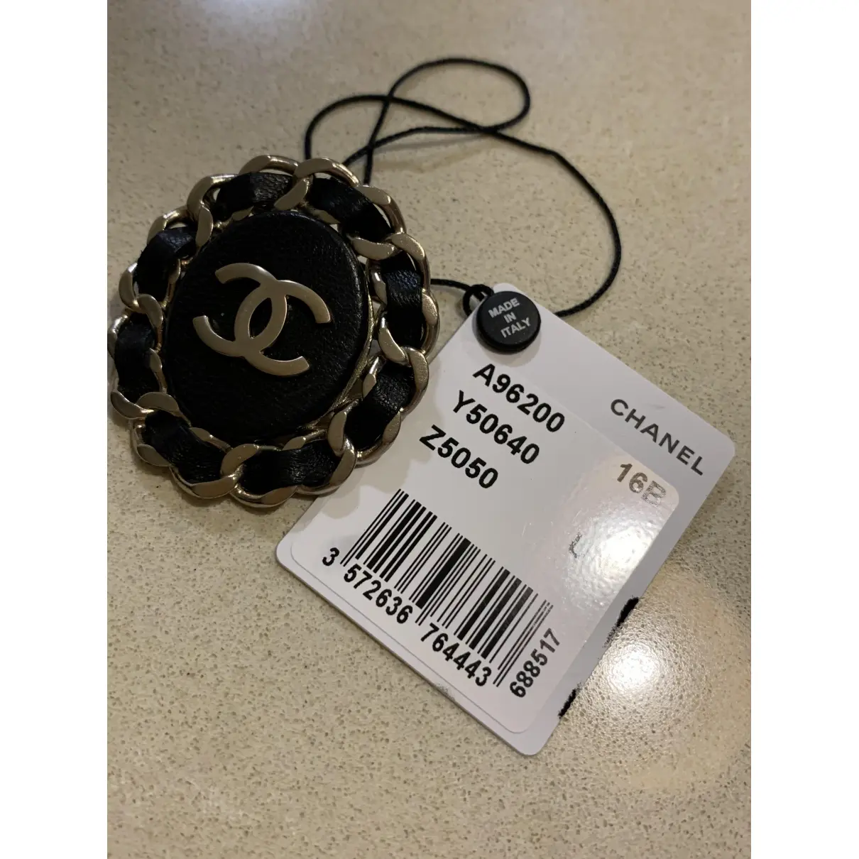 Buy Chanel CC leather pin & brooche online