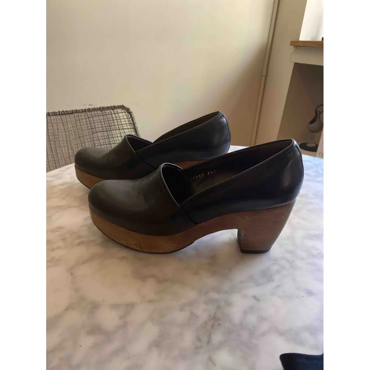 Buy Coclico Leather mules & clogs online