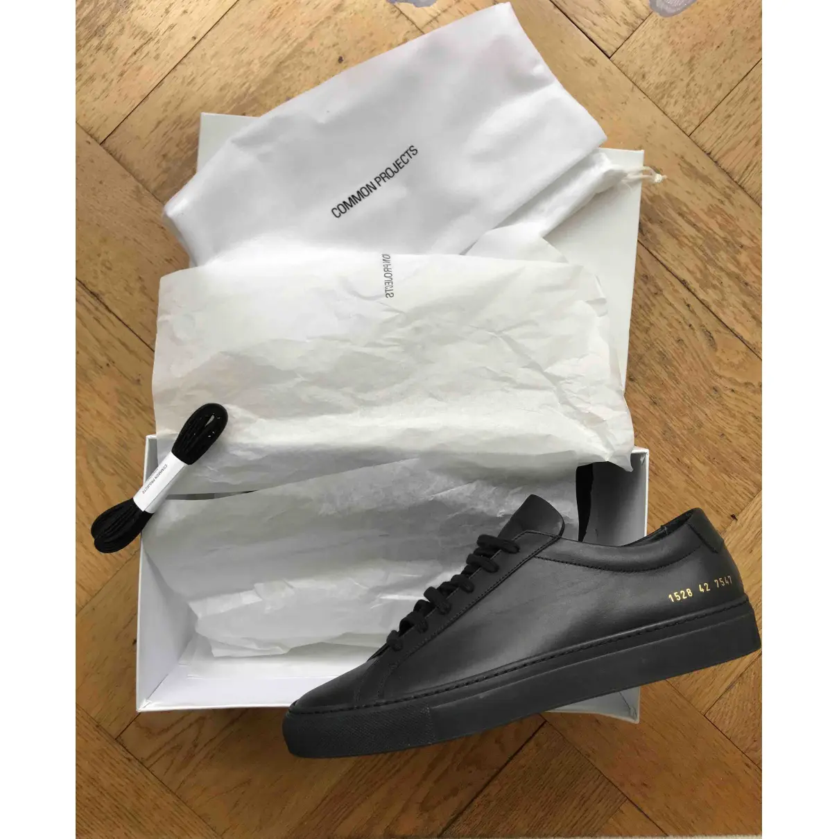 Buy Common Projects Leather low trainers online
