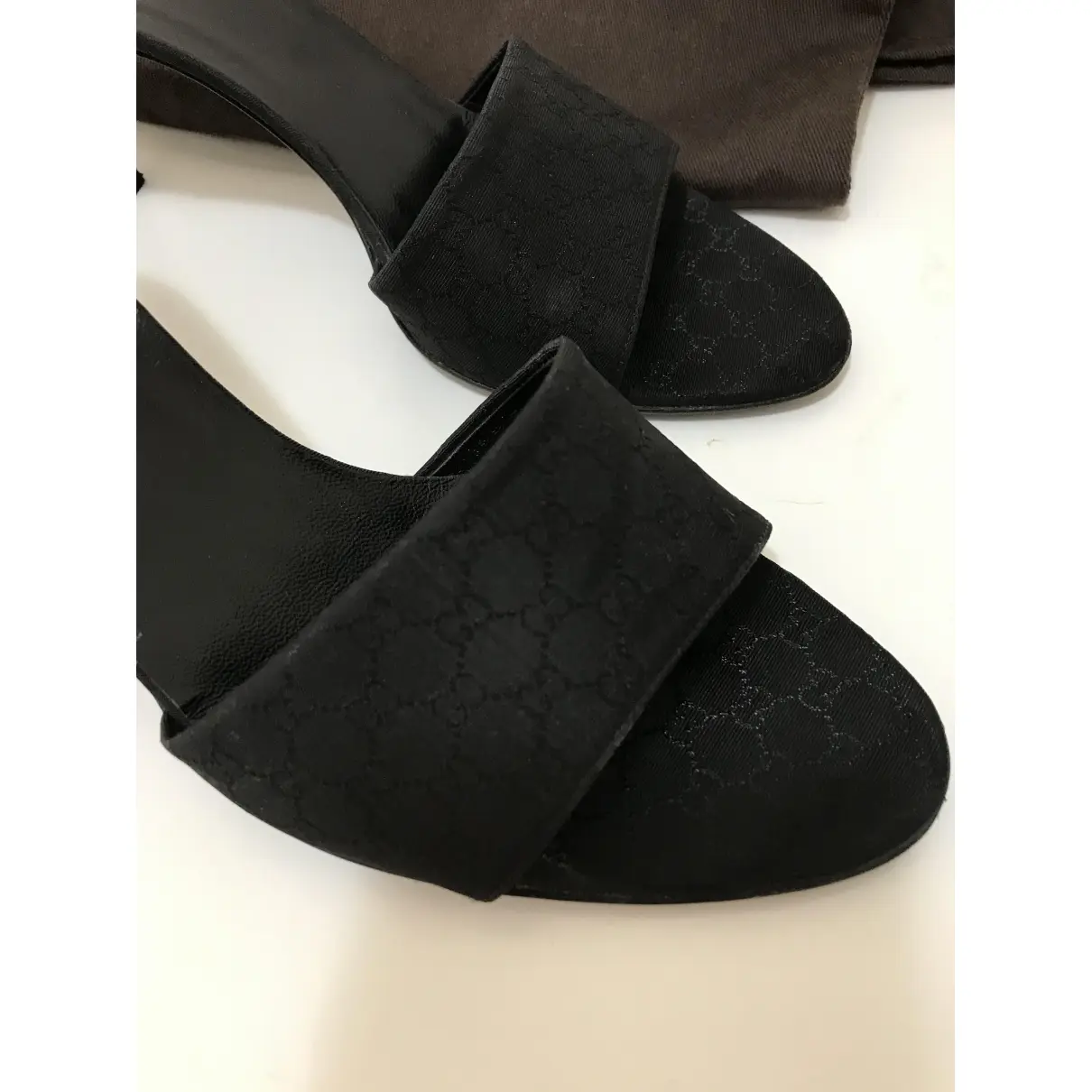 Buy Gucci Double G leather mules online