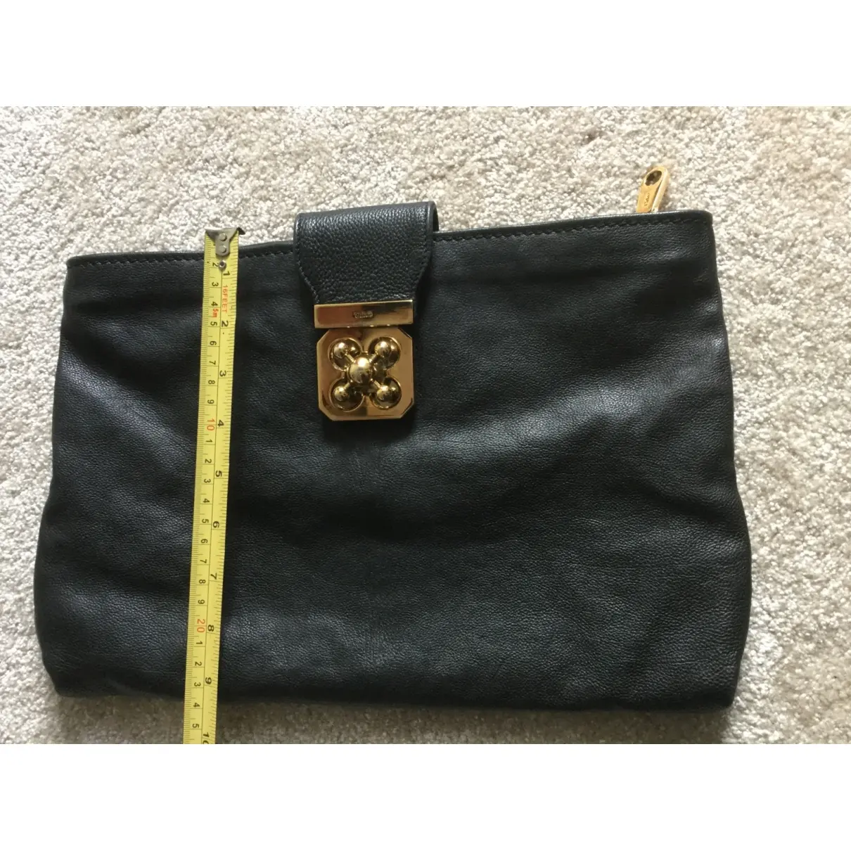 Buy Chloé Elsie leather clutch bag online