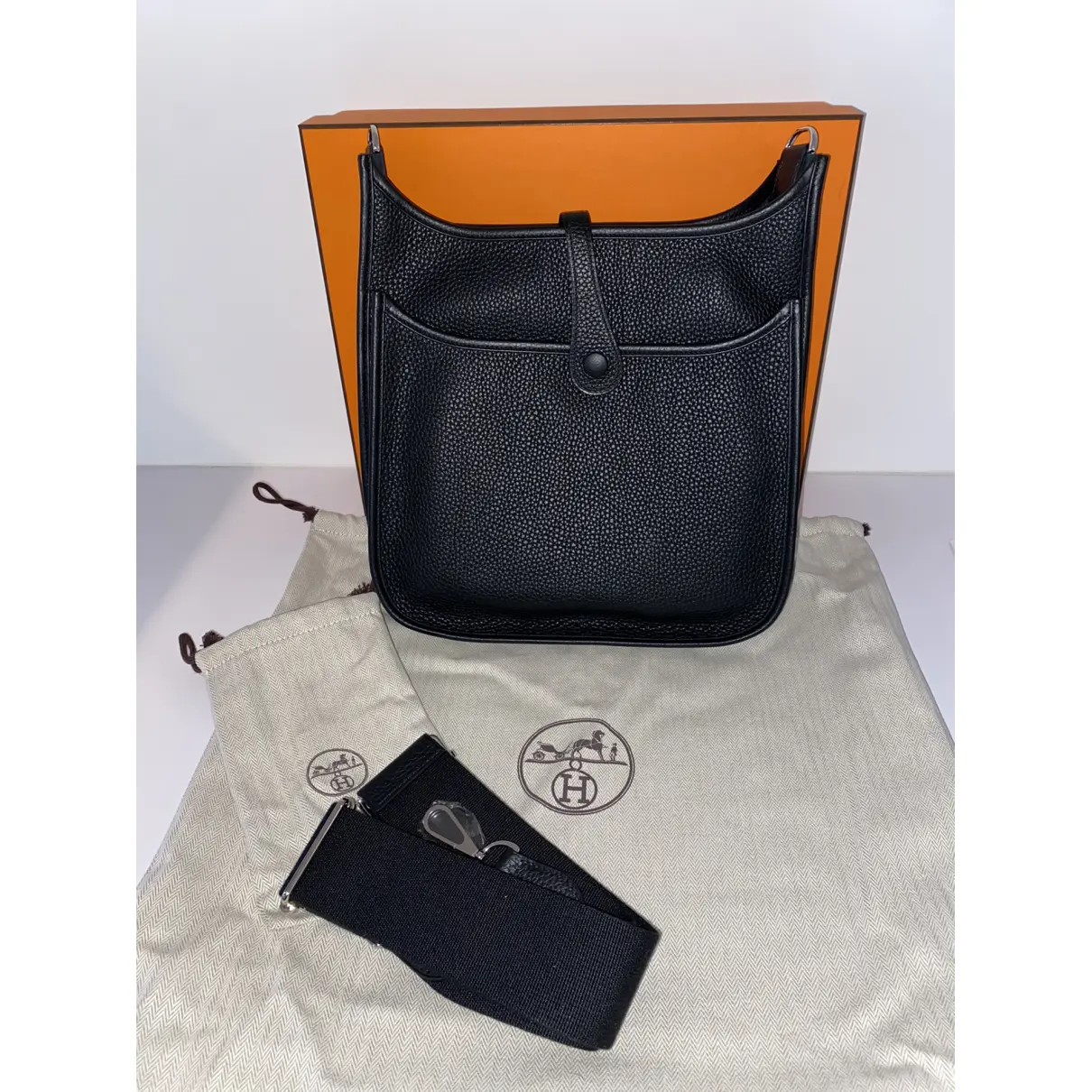 Buy Hermès Evelyne Sellier leather crossbody bag online