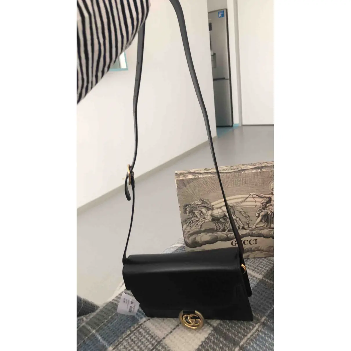 Buy Gucci GG Ring leather crossbody bag online