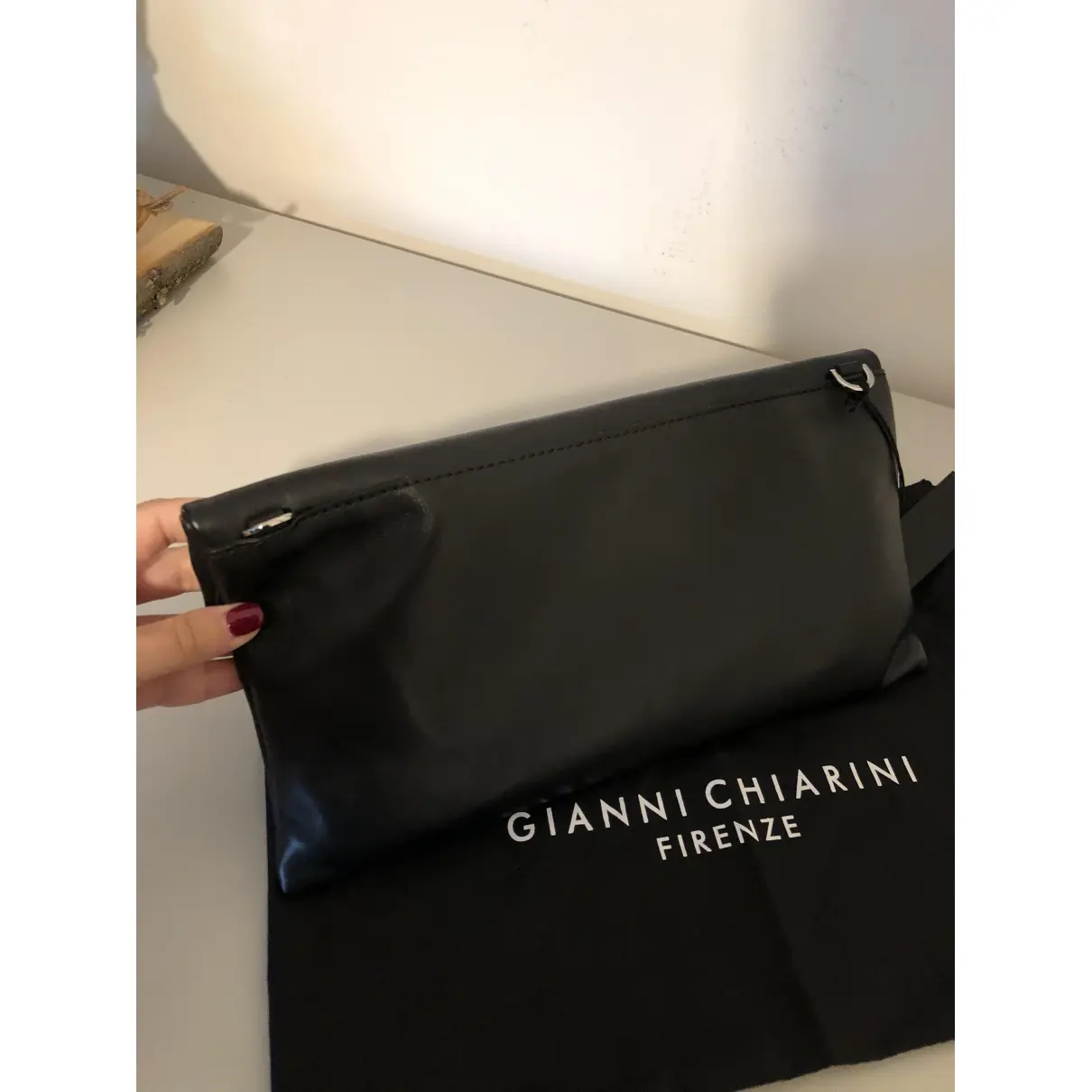 Buy Gianni Chiarini Leather clutch bag online