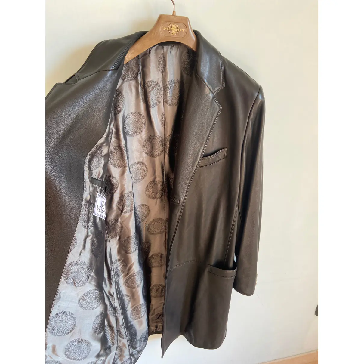 Buy Gianni Versace Leather coat online