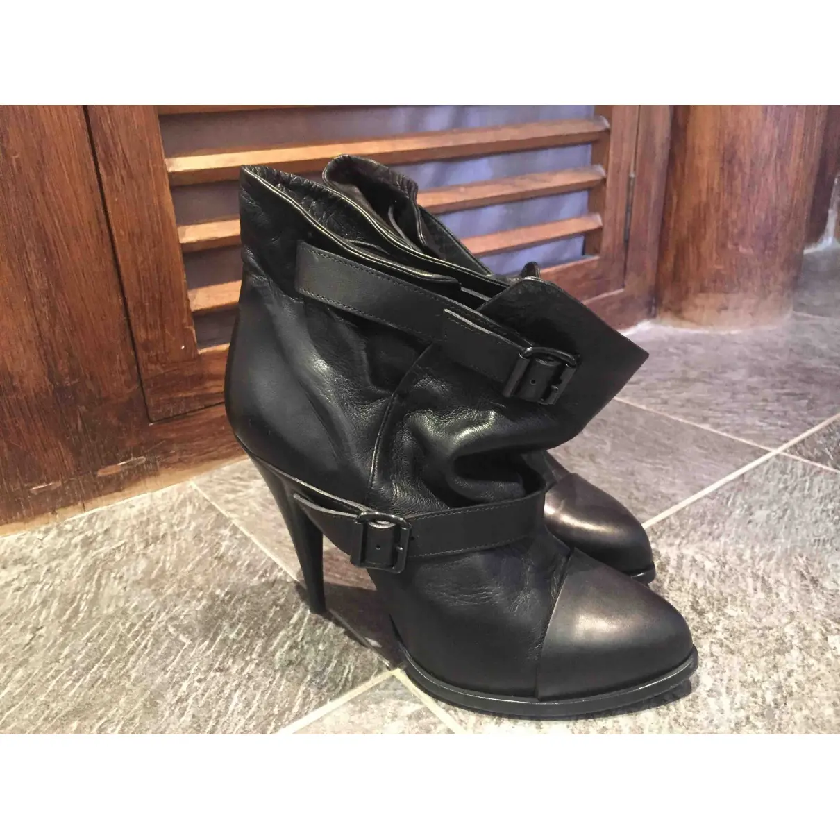 Buy Givenchy Leather buckled boots online