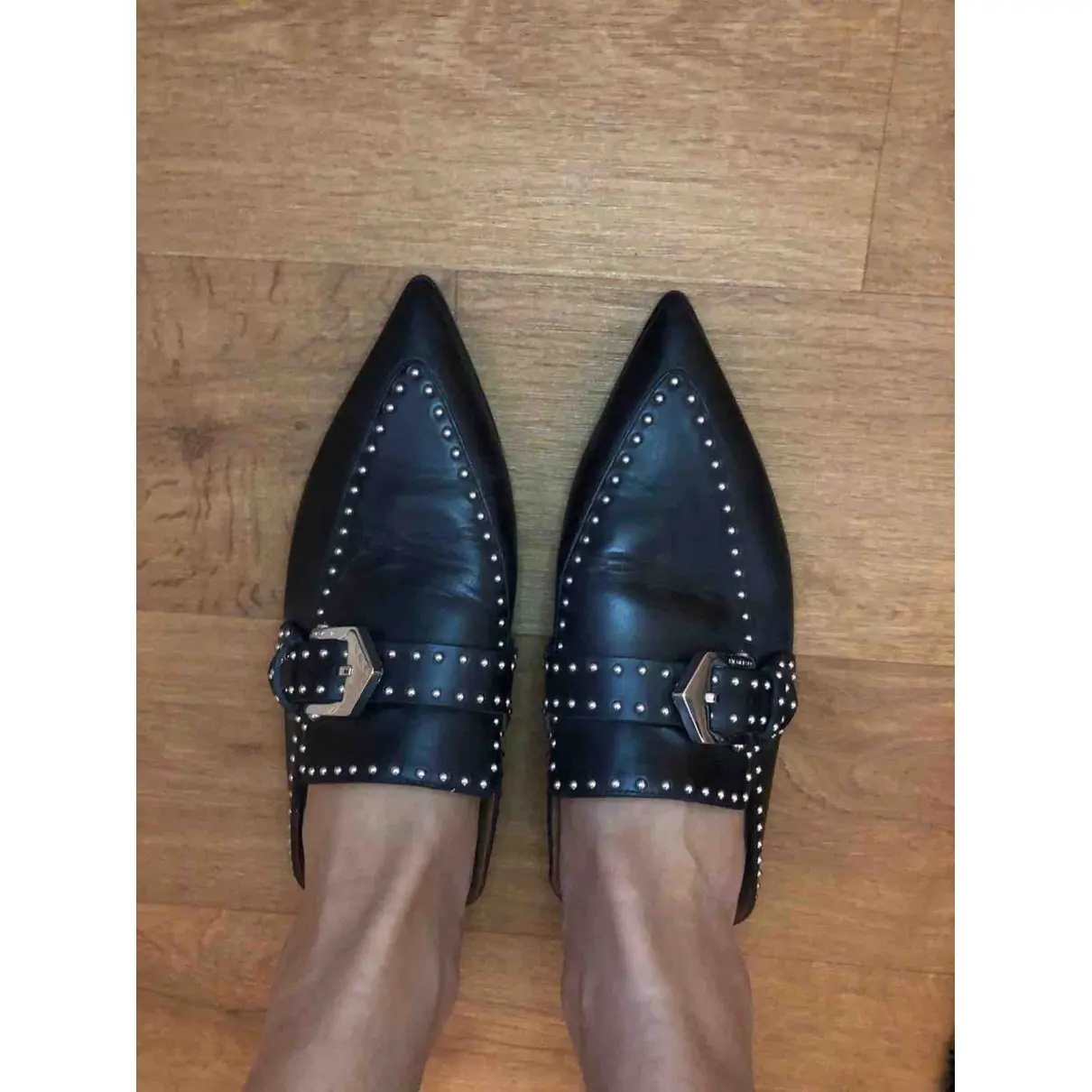 Buy Givenchy Leather mules & clogs online