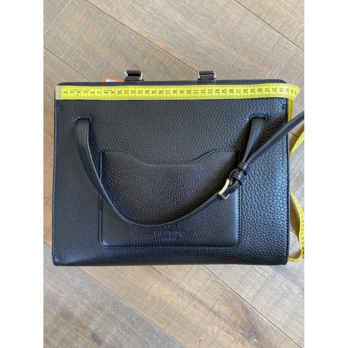 Buy Valentino Garavani JoyLock leather handbag online