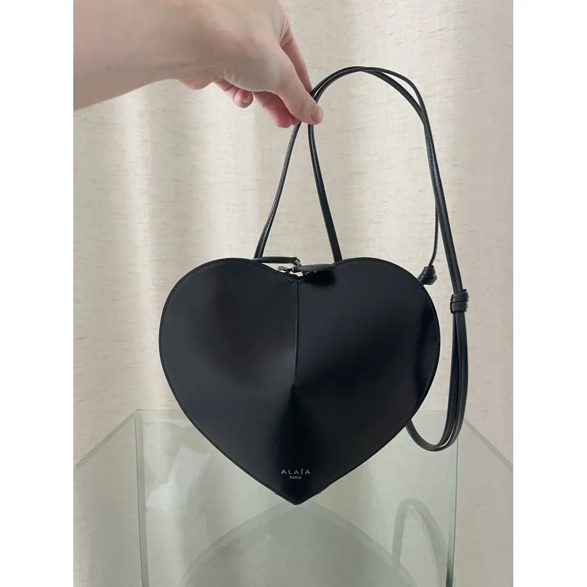 Buy Alaïa Le Coeur leather crossbody bag online