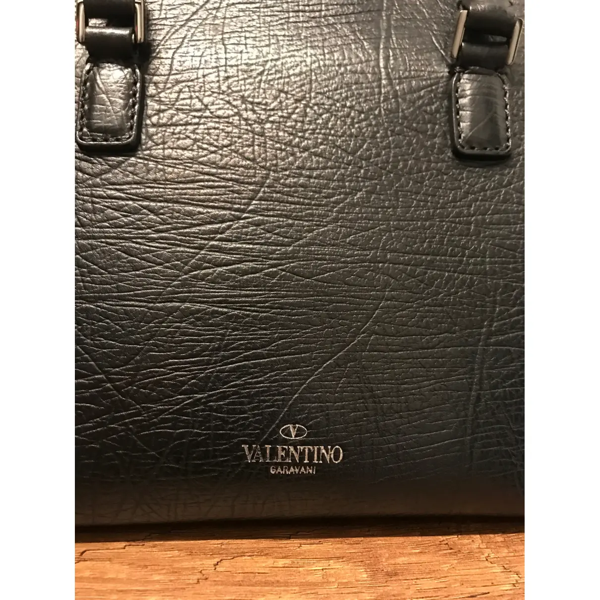 Buy Valentino Garavani Micro Rockstud leather handbag online