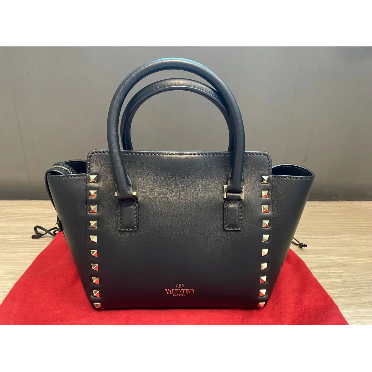 Buy Valentino Garavani Micro Rockstud leather handbag online