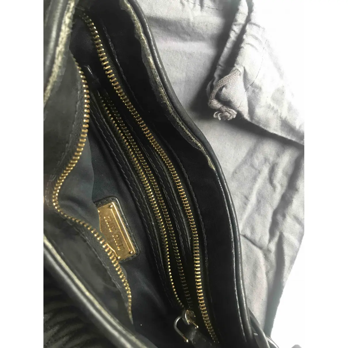 Leather clutch bag Miu Miu