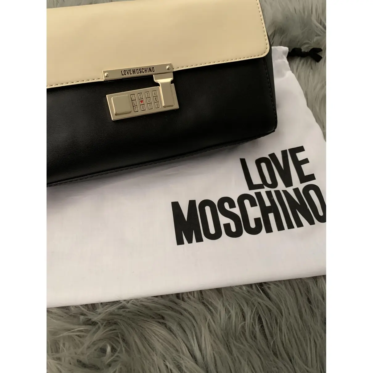 Buy Moschino Love Leather clutch bag online