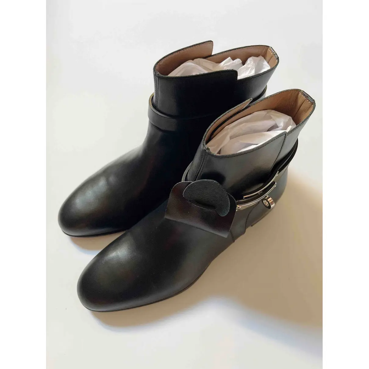 Buy Hermès Néo leather buckled boots online